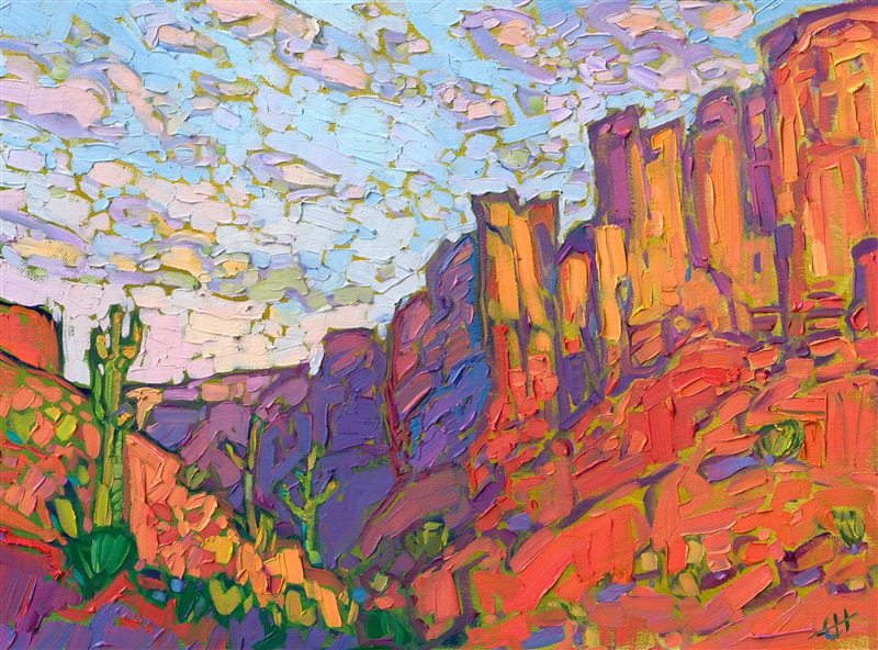 The American West is painted in iconic colors of orange, purple and green. The thick, impressionistic brush strokes capture the texture of the sandstone buttes. Each brush stroke fits together on the painting like a mosaic made of oil paint. </p><p>"Saguaro Buttes" is an original oil painting created on fine linen board. The piece arrives framed in a gold plein air frame. 