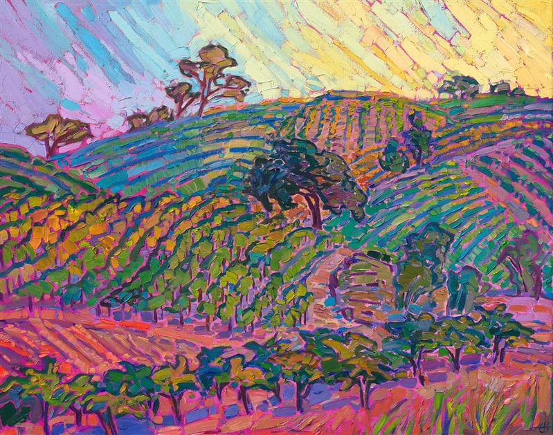Layers of vineyard-covered hills glow with the colors of sunset in this painting of Paso Robles, California. The wine country in central California is filled with softly rounded hills and ancient oak trees, with enough color to inspire hundreds of paintings!</p><p><b>Please note:</b> This painting will be hanging in a museum exhibition until November 5th, 2023. This piece is included in the show <i><a href="https://www.erinhanson.com/Event/ErinHansonatBoneCreekMuseum">Erin Hanson: Color on the Vine</i></a> at the Bone Creek Museum of Agrarian Art in Nebraska. You may purchase the painting now, but you will not receive the painting until after the show ends. You will receive your painting a week or two before Thanksgiving 2023. </p><p>"Vineyard Light" is an original oil painting created on stretched canvas. The piece arrives framed in a contemporary floater frame finished in burnished 23kt gold leaf.
