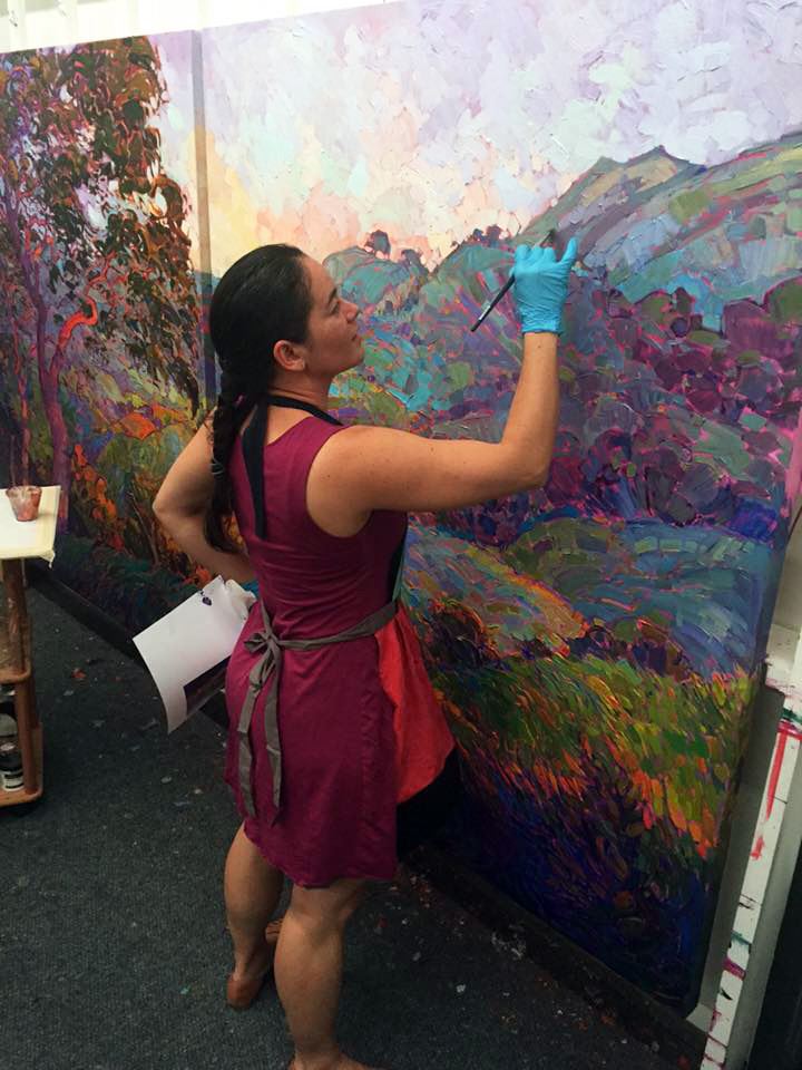 Erin Hanson painting a large masterpiece