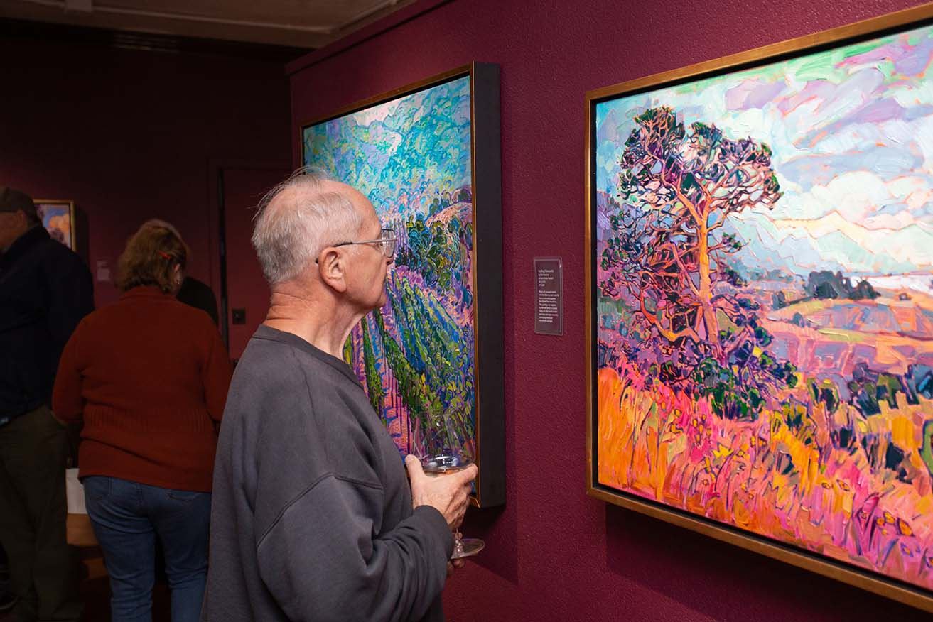 Admiring a piece by Erin Hanson