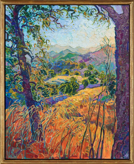 Oil painting of hills and trees by Erin Hanson framed in a gold floater frame