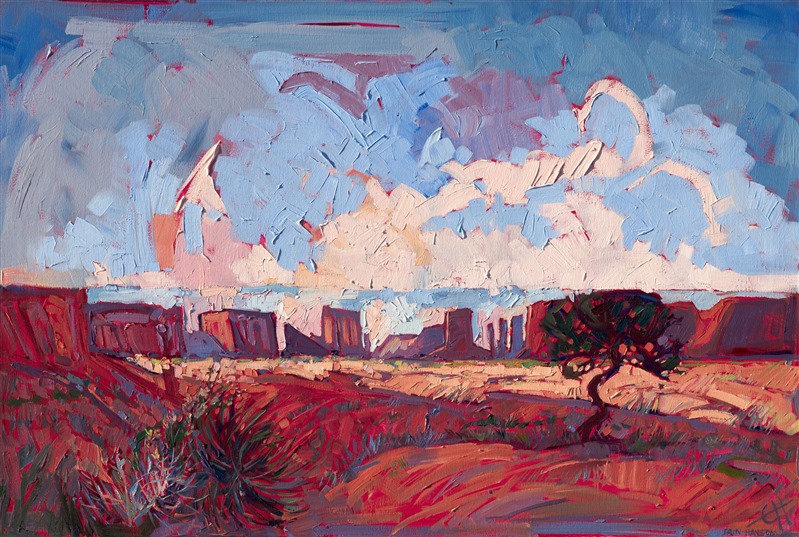 Oil painting of Arizona Monument Valley with red sandstone buttes standing on the horizon against the blue sky by artist Erin Hanson