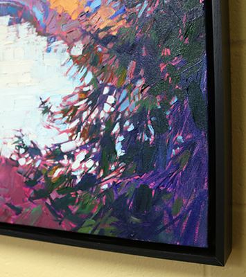 An Erin Hanson painting in a black floater frame