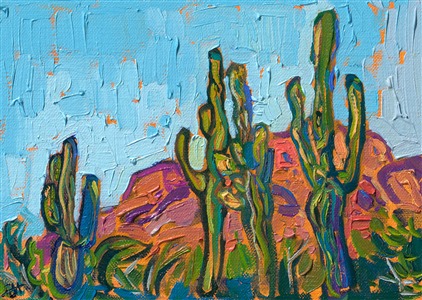 A petite work captures the beauty of Arizona with thick, expressive brush strokes of oil paint. Stately saguaros stand tall before a red rock boulder. This piece was created on linen board and arrives framed and ready to hang.