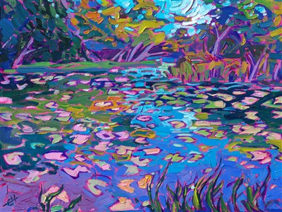Multi-colored light glows on the surface of the lily pond, catching the green leaves and swirling in the waters. The brush strokes are loose and impressionistic, capturing the fleeting light of the scene.

"Lily Reflections" was created on linen board, and the petite oil painting arrives framed in a gold plein air frame.