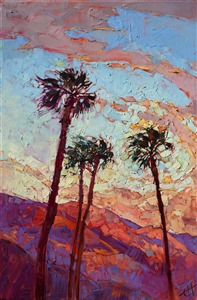 Desert winds blow through these iconic palms of Palm Springs, the sunset light catching in the fronds.  The mosaic light creates a stained glass pattern of color across the desert sky.