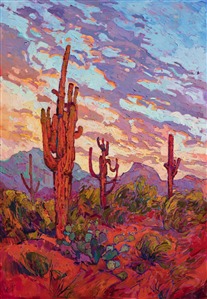 A dramatic sunset sky lights up the background of these stately saguaros.  The desert brush and prickly pear cacti in the foreground create texture and interest in the foreground of this piece.  The brush strokes in this painting are loose and impressionistic, alive with color and texture.