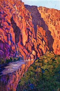 The dramatic limestone canyons of Big Bend National Park are most beautiful just at sunset when the cliffs turn multi-hued shades of vermillion and orange. The still waters of the Rio Grande catch the gilded reflection of the cliffs. This painting was created with thick, impasto brush strokes, adding a dimension of texture to the piece.

This painting will be on display at the Museum of the Big Bend, during the solo exhibition <i><a href="https://www.erinhanson.com/Event/MuseumoftheBigBend" target="_blank">Erin Hanson: Impressions of Big Bend Country.</a></i> This painting will be ready to ship after January 10th, 2019. <a href="https://www.erinhanson.com/Portfolio?col=Big_Bend_Museum_Show_2018">Click here</a> to view the collection.

This painting has been framed in a custom-made gold frame. The painting arrives ready to hang.