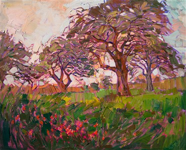 Hill Country wildflowers blanket the spring-green grasses beneath these oak trees.  The motion in the branches and mosaic quality of the light create an abstract landscape that captures the imagination.
