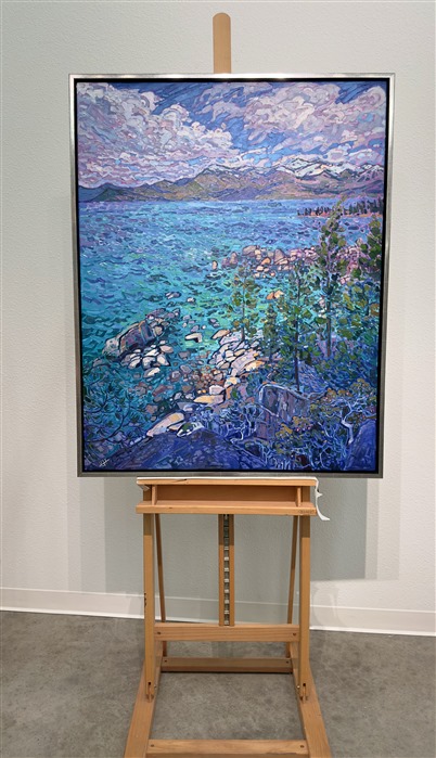 The startling aquamarine colors of Lake Tahoe glimmer in the summer afternoon. The impressionistic brush strokes capture the depth and beauty of the alpine waters. The rich blue hues are a beautiful contrast against the white granite boulders that surround the lake.</p><p>"Alpine Tahoe" is an original oil painting on stretched canvas. The piece arrives framed in a silver floater frame, ready to hang.