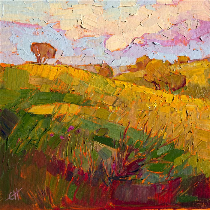Amber waves of golden grass wave in the wind, in this beautifully composed painting of Paso Robles wine country.  Each brush strokes is applied in a loose, impressionist style.</p><p>This small oil painting arrives framed and ready to hang. The second photograph above shows the painting hanging in gallery spot lighting.