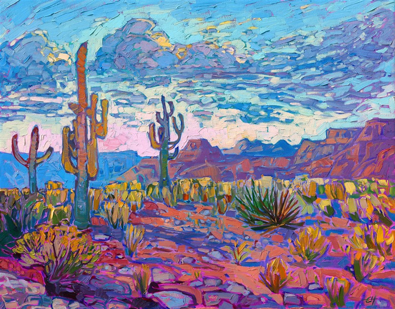 The stately saguaro stands tall against a desert backdrop rich with color. This painting was inspired by the landscape near Scottsdale, Arizona. The brush strokes are loose and expressive, capturing the movement and vibrant hues of the vista.</p><p>"Arizona Clouds" is an original oil painting on 1-1/2" deep canvas. The piece has been framed in a contemporary gold floater frame. "Arizona Clouds" will be on display at the Desert Caballeros Museums and will be available to purchase through their annual <a href="https://westernmuseum.org/about-cowgirl-up/" target="_blank">Cowgirl Up!</a> exhibition.