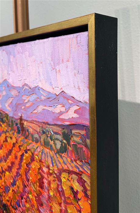 Rich hues of autumn are illuminated by the soft light of early morning in this painting of Paso Robles wine country. The rolling hills of vineyards draw the eye into the painting and into the imagination. Impasto brush strokes capture the movement and texture of the scene.</p><p>"Autumn Dreams" is an original oil painting on stretched canvas. The piece arrives framed in a 23kt gold floater frame, ready to hang.</p><p><b>Please note:</b> This painting will be hanging in a museum exhibition until November 5th, 2023. This piece is included in the show <i><a href="https://www.erinhanson.com/Event/ErinHansonatBoneCreekMuseum">Erin Hanson: Color on the Vine</i></a> at the Bone Creek Museum of Agrarian Art in Nebraska. You may purchase the painting now, but you will not receive the painting until after the show ends in November 2023.