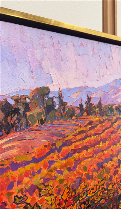 Rich hues of autumn are illuminated by the soft light of early morning in this painting of Paso Robles wine country. The rolling hills of vineyards draw the eye into the painting and into the imagination. Impasto brush strokes capture the movement and texture of the scene.</p><p>"Autumn Dreams" is an original oil painting on stretched canvas. The piece arrives framed in a 23kt gold floater frame, ready to hang.</p><p><b>Please note:</b> This painting will be hanging in a museum exhibition until November 5th, 2023. This piece is included in the show <i><a href="https://www.erinhanson.com/Event/ErinHansonatBoneCreekMuseum">Erin Hanson: Color on the Vine</i></a> at the Bone Creek Museum of Agrarian Art in Nebraska. You may purchase the painting now, but you will not receive the painting until after the show ends in November 2023.