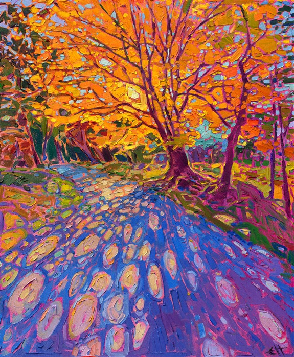 Golden hues of autumn drench the landscape with saturated colors. This impressionist oil painting captures the fleeting colors of autumn at their peak. This work was inspired by the Blue Ridge Mountains in South Carolina.</p><p>"Autumn Lights" is an original oil painting by Erin Hanson, created on stretched canvas. The piece arrives framed in a custom floater frame finished in burnished, 23kt gold leaf.