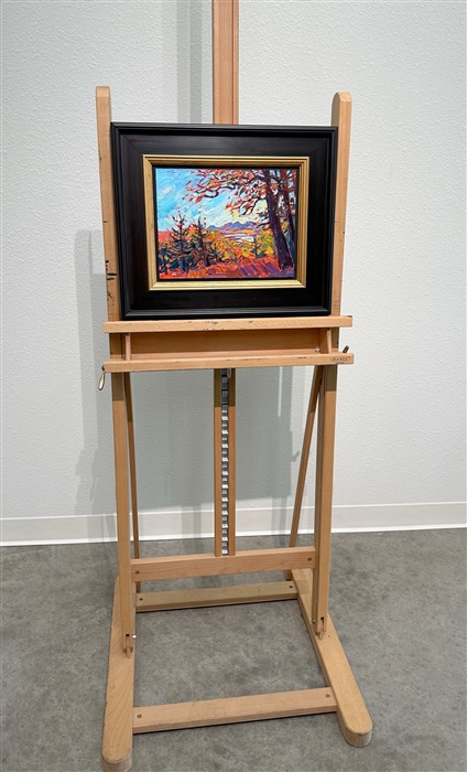 A petite canvas captures the wide landscape and vivid fall colors of the Blue Ridge Mountains in South Carolina. Blue Ridge Parkway is the most-traveled highway in the U.S., as leaf peepers from far and wide gather to see the brilliant fall foliage.</p><p>"Blue Ridge Vista" is an original oil painting on linen board. The piece arrives framed in a classic black and gold plein air frame, ready to hang.