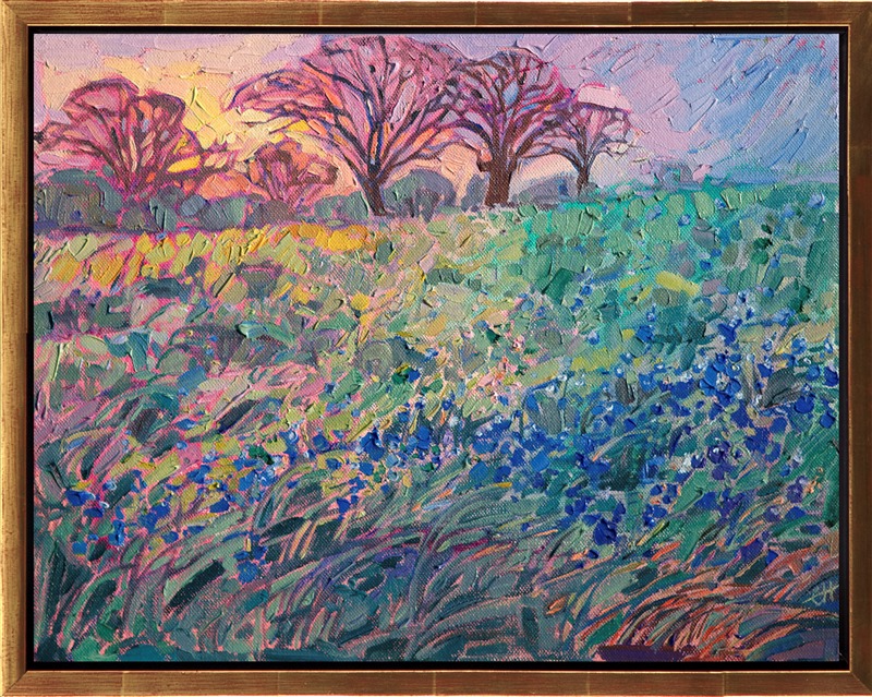 Texas bluebonnets tumble down the hillside in this impressionistic painting. The warm sunset light casts a golden glow across the landscape.</p><p>This painting was created on 1-1/2" deep canvas, and it has been framed in a 23kt gold floater frame.