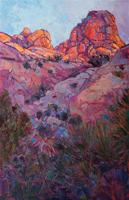 Joshua Tree National Park is most beautiful at dawn, the boulders glowing with myriad rainbow hues.  The shadows are rich with reflected color, a beautiful contrast to the sun-lit rocks in the distance.  The brush strokes in this oil painting are thick and impressionistic.</p><p>This painting was created on gallery-depth canvas with the painting continued around the edges. The painting will arrive in a beautiful hardwood floater frame, ready to hang.