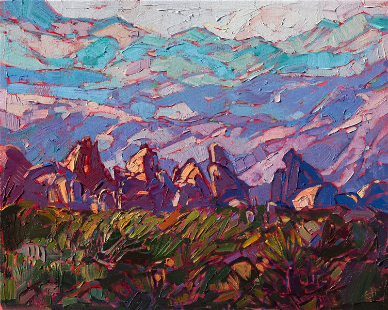 Small boulders frolic in the foothills of the desert mountain ranges of Joshua Tree National Park.  The loose, playful brush strokes are alive with motion and light.  This small oil painting has been framed and arrives ready to hang.