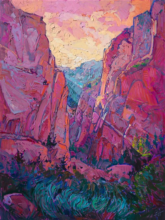 Fading light rays gleam through the red rock canyon cliffs of Kolob Canyon, part of Zion National Park.  The rich yellow rays create a bold purple shadow in contrast.
