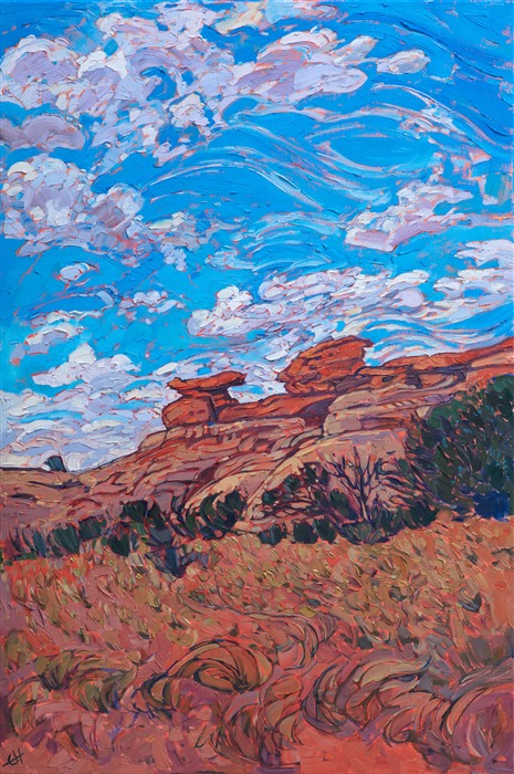 Cheerful summer clouds glide across a desert blue sky in this painting of Canyonlands National Park, Utah. This national park takes up a huge expanse of land and contains myriad red rock formations, canyon systems, and mesas.  This painting was inspired by a hike through the red rock formations in the Needles district.</p><p>This painting was done on 1-1/2" canvas, with the painting continued around the edge of the canvas.  This piece has been framed in a beautiful, hand-carved open impressionist frame.</p><p>Exhibited: <a href="https://www.erinhanson.com/Event/redrock2018" target=_blank"><i>The Red Rock Show</i></a> at The Erin Hanson Gallery, 2018.  <a href="https://www.erinhanson.com/Portfolio?col=The_Red_Rock_Show_2018" target="_blank"><u>Click here</u></a> to view the other Red Rock paintings.