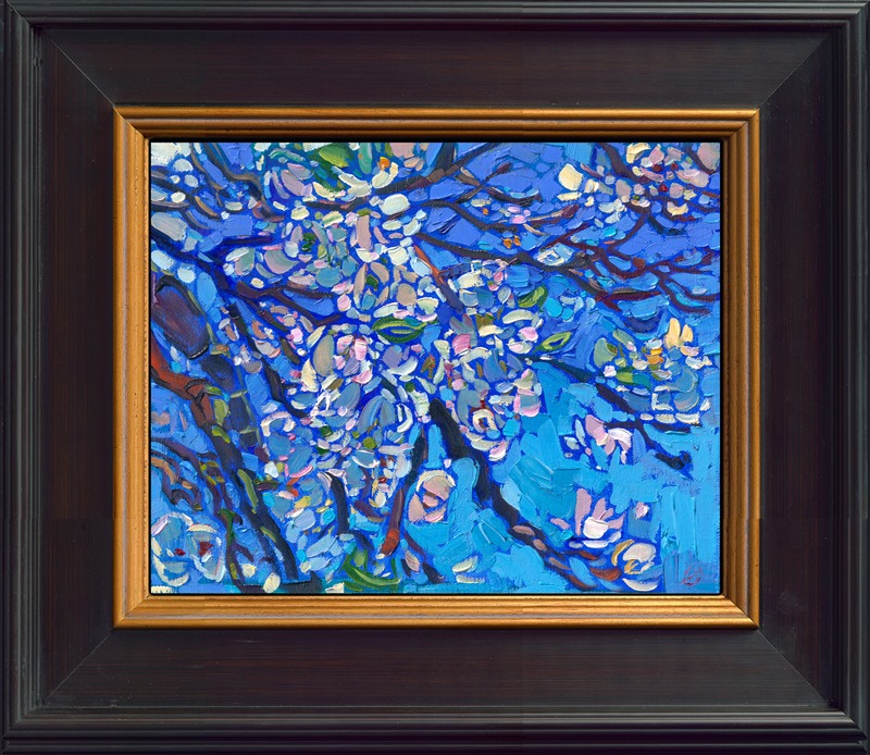 Cherry blossoms are captured in thick brush strokes and impressionistic color. "Cherry Blues" is an original oil painting on linen board, done in Erin Hanson's signature Open Impressionism style. The piece arrives framed in a wide, mock floater frame finished in black with gold edging.</p><p>This piece will be displayed in Erin Hanson's annual <i><a href="https://www.erinhanson.com/Event/petiteshow2023">Petite Show</i></a> in McMinnville, Oregon. This painting is available for purchase now, and the piece will ship after the show on November 11, 2023.