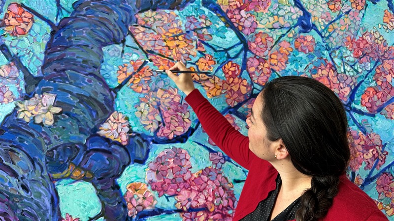 This large-scale oil painting by Erin Hanson captures the vibrant beauty of cherry blossoms in spring. The brush strokes are thick and expressive, capturing the light of the golden hour with an impressionistic eye.</p><p>"Cherry in Bloom" is an original oil painting on a 2-inch deep stretched canvas. The piece is 80 inches tall and 100 inches wide, and the museum-depth sides of the painting are painted "wrap-around style," so the piece can hang without a frame.