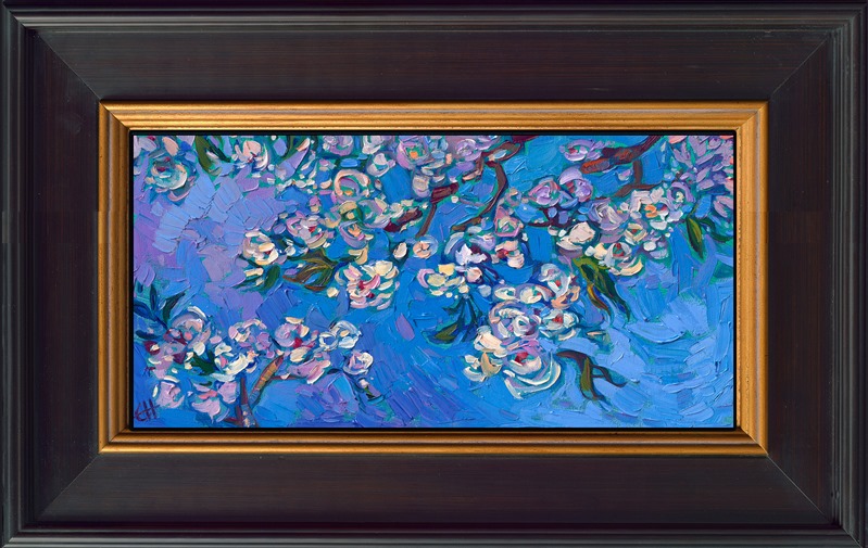 A petite canvas captures the epitome of spring: white cherry blossoms against a blue sky. The expressive brush strokes are alive with movement and texture, communicating the vivacity of spring.</p><p>"Cherry on Blue" is an original oil painting on linen board. The piece arrives framed in a mock floater frame, finished in classic black and gold. 