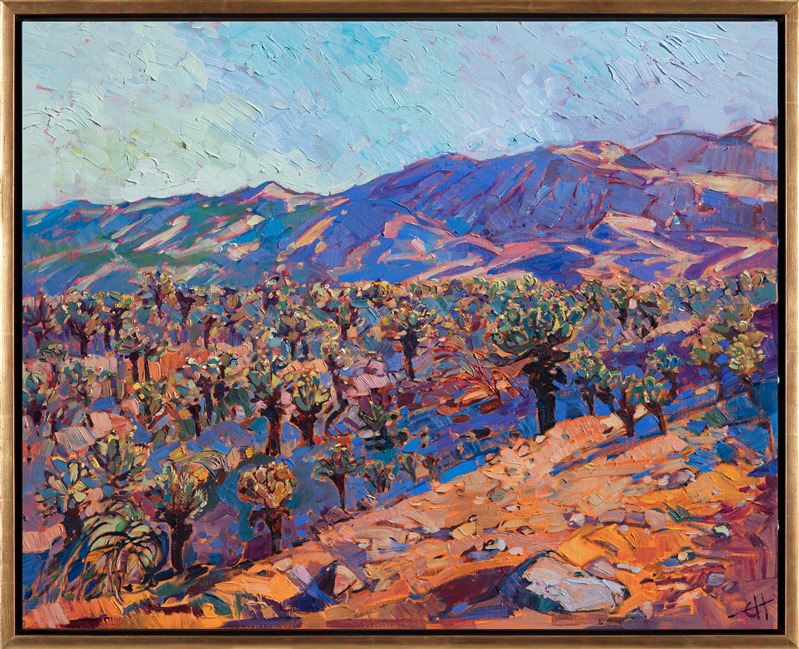 The cholla cactus fields in Joshua Tree National Park are amazing to see in person - the desert floor seems to glow with color as all the green cacti spines catch the light.  This painting depicts a late afternoon view of the desert in spring.</p><p>This piece was created on 1-1/2" gallery-depth canvas, with the painting wrapped around the sides of the canvas.  It has been framed in a gold floating frame.
