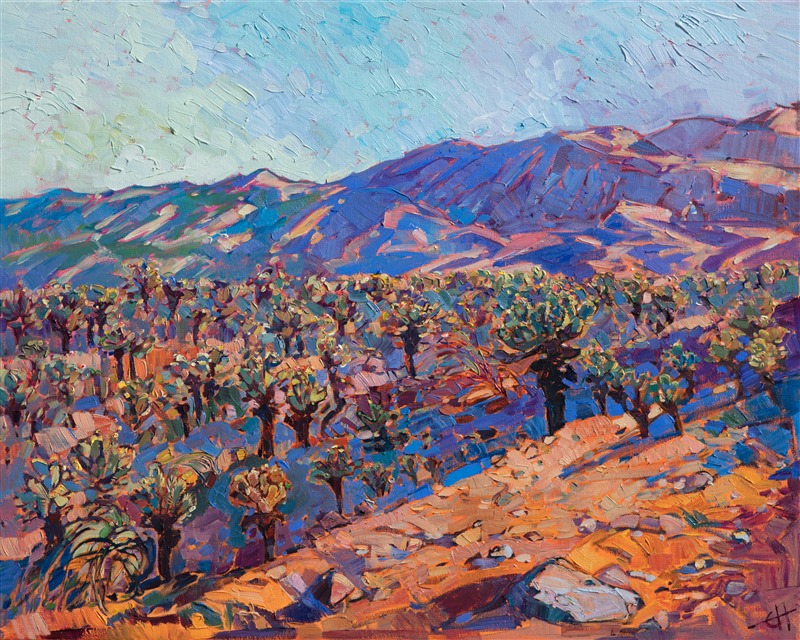 The cholla cactus fields in Joshua Tree National Park are amazing to see in person - the desert floor seems to glow with color as all the green cacti spines catch the light.  This painting depicts a late afternoon view of the desert in spring.</p><p>This piece was created on 1-1/2" gallery-depth canvas, with the painting wrapped around the sides of the canvas.  It has been framed in a gold floating frame.