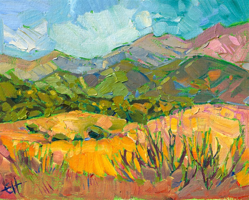Verdant green hills contrast with the summer-burnt grasses of the foreground.  The thickly applied brush strokes create a tapestry of contrasting color and texture.