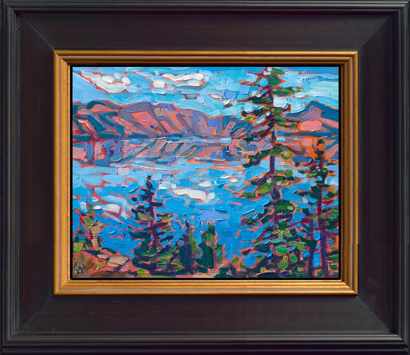 A petite work captures the epic landscape of Crater Lake in southern Oregon. The thickly applied brush strokes glisten with color and movement.</p><p>"Crater Lake in Petite" is an original oil painting on linen board, done in Erin Hanson's signature Open Impressionism style. The piece arrives framed in a wide, mock floater frame finished in black with gold edging.</p><p>This piece will be displayed in Erin Hanson's annual <i><a href="https://www.erinhanson.com/Event/petiteshow2023">Petite Show</i></a> in McMinnville, Oregon. This painting is available for purchase now, and the piece will ship after the show on November 11, 2023. 