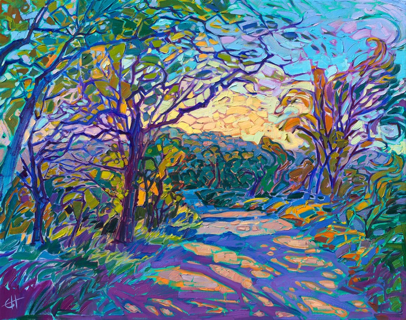 A winding country road in Texas Hill Country is shadowed by willowy oak trees casting delicate patterns across the path. The prismatic light is fractured through the tree boughs like a mosaic or stained glass. The thickly applied brush strokes of oil paint add texture and movement to the piece.</p><p>"Crystalline Oaks" was created on gallery-depth canvas, and the painting arrives framed in a closed-corner, gilded floater frame.