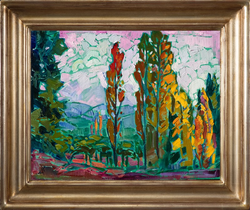 A row of poplar trees turning hues of autumn catch the afternoon light in this oil painting of Napa, California. The brush strokes are loose and impressionstic, creating a mosaic of color across the canvas.</p><p>"Dawning Autumn" was created on fine linen board, and the piece arrives framed in a custom-made, gold plein air frame.