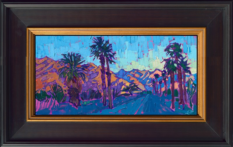La Quinta is captured in bold brushstrokes and an impressionistic eye for color. The abstract shapes of the Santa Rosa mountains catch the changing hues of the setting sun, a beautiful backdrop behind the stately desert palms. </p><p>"Dawning Desert" is an original oil painting on linen board. The piece arrives framed in a contemporary black and gold frame, ready to hang.