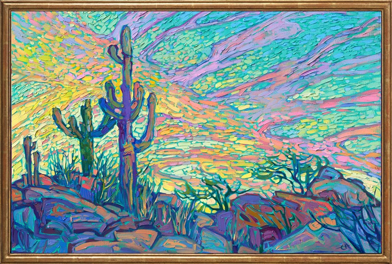 Dawning clouds are illuminated in hues of sherbet and butter yellow. The springtime saguaros stand tall and stately against the sky. Each brush stroke is thick and impressionistic, conveying a sense of movement throughout the painting.</p><p>"Dawning Saguaro" was created on gallery-depth canvas, and the painting arrives framed in a gold floater frame, ready to hang.