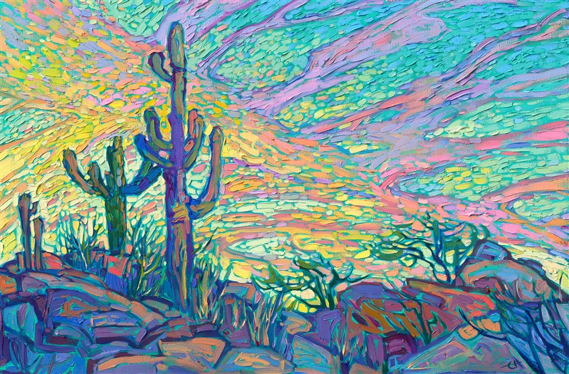 Dawning clouds are illuminated in hues of sherbet and butter yellow. The springtime saguaros stand tall and stately against the sky. Each brush stroke is thick and impressionistic, conveying a sense of movement throughout the painting.</p><p>"Dawning Saguaro" was created on gallery-depth canvas, and the painting arrives framed in a gold floater frame, ready to hang.