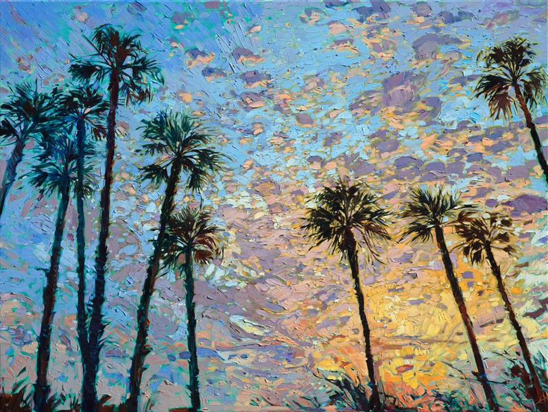 A dramatic sky bursts with color behind this grove of California palms. This painting captures all the life and movement of a bright and brilliant sunrise. The brush strokes are loose and impressionistic, alive with color and texture.</p><p>This painting has been framed in a gold leaf floater frame. The painting was created on 1-1/2" canvas, with the edges of the canvas painted as a continuation of the piece.
