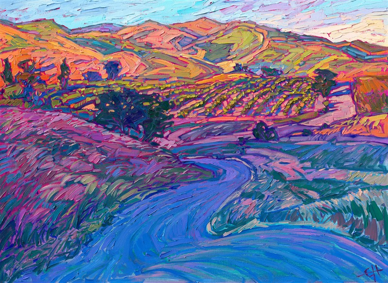 The vineyard-covered hills of Paso Robles, California, catch the early morning light in this idyllic scene. Rich hues of burnt orange and pink sherbet dance across the grassy hills, while the road in the foreground is colored in cool, shadowy hues of blue and purple.</p><p>"Dawning Vines" is an original oil painting by Erin Hanson, created in her signature Open Impressionism style. The brush strokes are loose and thickly textured, alive with color and motion.