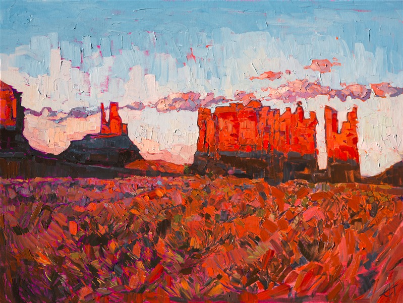 Dramatic sunset light plays over these buttes at Monument Valley.  The Four Corners region has some of the most stunning color in the Western states.  Rich lavenders and bold cadmium hues come to life at sunset, captured here in thick impressionistic oils.</p><p>This painting was created on a gallery-depth canvas with the painting continued around the edges. The painting will arrive in a beautiful hardwood floater frame, ready to hang.</p><p>Exhibited: St George Art Museum, Utah, in a solo exhibition celebrating the National Park's centennial: <i><a href="https://www.erinhanson.com/Event/ErinHansonMuseumShow2016" target="_blank">Erin Hanson's Painted Parks</a></i>, 2016.