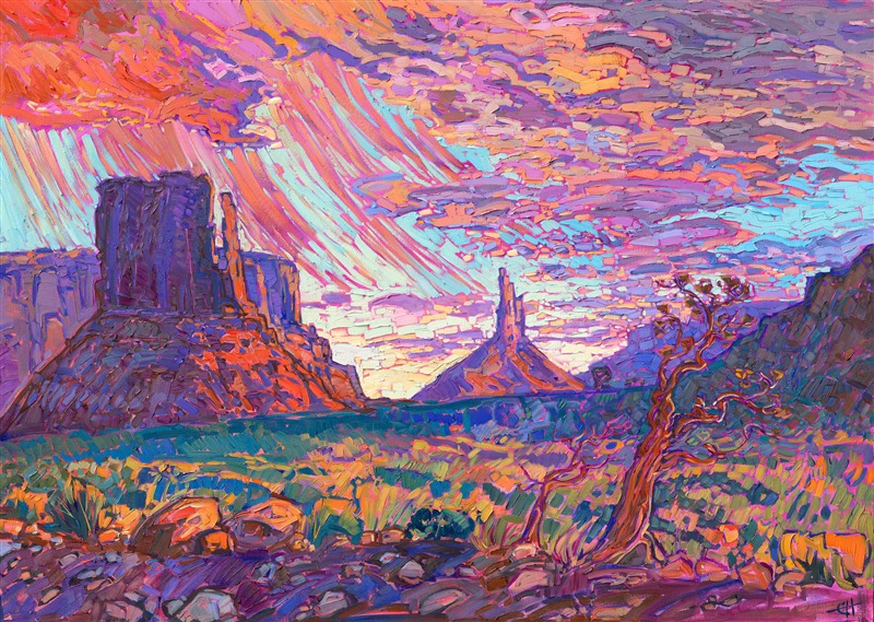 Deep in Monument Valley, standing between the looming Mittens, a passing monsoon showered down upon the red desert earth. The buttes glowed pink and purple in the light of the setting sun, while the green and gold desert shrubs glinted in the fading light.</p><p>"Desert Monsoon" is an original oil painting created on stretched canvas and framed in a contemporary gold floater frame.