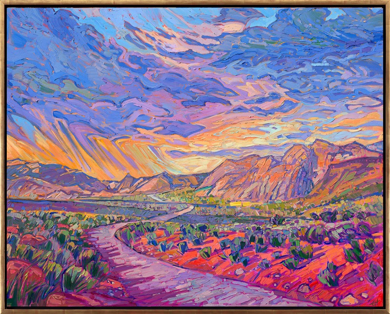Dramatic monsoon clouds sweep over the desert mountains of northwestern Arizona. The highway winds between the dramatic shadows cast by the ever-moving clouds, disappearing into the distant mountain range. The brush strokes in this oil painting are thick and expressive, alive with color and energy.</p><p>"Desert Road" is an original oil painting on stretched canvas. The piece arrived framed in a gold floater frame finished in burnished, 23kt gold leaf.