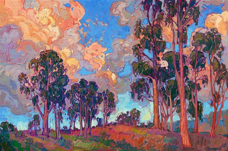 San Diego eucalyptus trees stand in silhouette against a sunset sky. The large billowing clouds are often seen rolling in off the coast, and when the sun goes down they turn brilliant shades of orange sherbet and lavender. This painting captures all the beauty of this transient light. 

"Diego Eucalyptus" was created on 1-1/2" canvas, with the painting continued around the edges. The piece arrives framed in a 23kt gold floater frame.