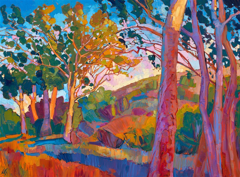 The eucalyptus trees of southern California seem to always have a special light around them, their chalky bark reflecting even the most subtle pinks and blues of the atmosphere. This is one of the many groves of eucalyptus trees that attracted Erin in the La Jolla vicinity.</p><p>"Eucalyptus Grove" is an original oil painting on canvas. The piece has been framed in a gold floater frame, and it arrives ready to hang.