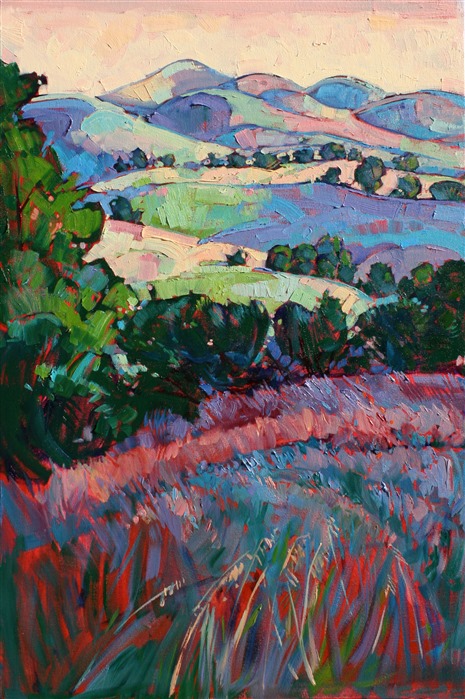 Pale pastel hills are a beautiful contrast against the deep green oak trees and fields of wildflowers. The brush strokes are thick and impressionistic, creating a mosaic of color and texture.