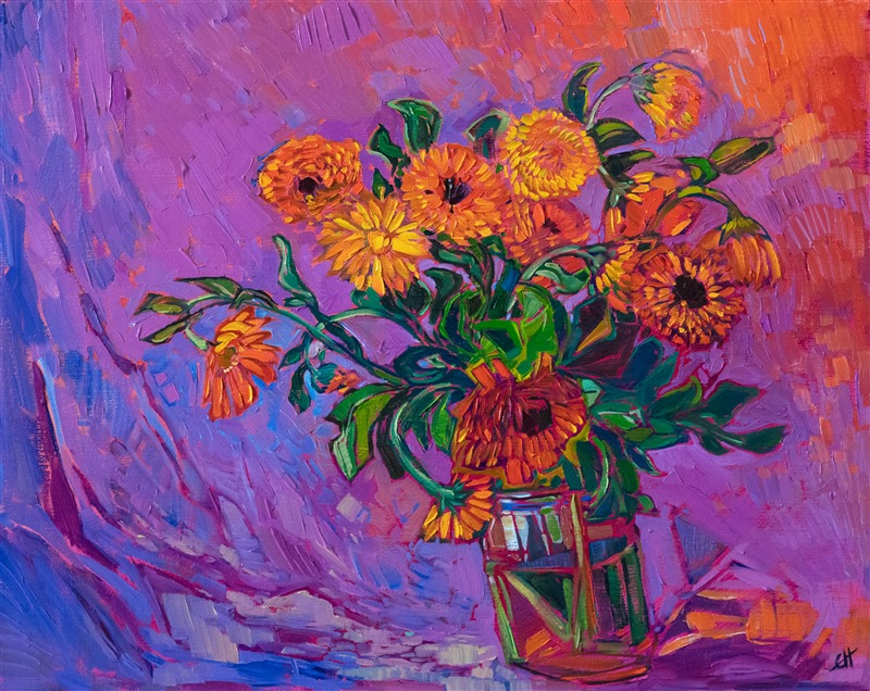A vase of orange blooms rests against a cloth backdrop. The brush strokes in the painting are thick and impressionistic, capturing the vivid colors and energy of the flowers.</p><p>"Floral in Orange" was created on fine linen board, and the painting arrives framed in a hand-made and gilded plein air frame.