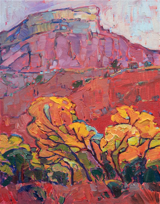 Ghost Ranch is an amazing place to visit; it is like seeing Georgia O'Keeffe's paintings come alive in three dimensions.  This is a painting inspired by a visit to her compound in New Mexico. The cottonwood trees were turning brilliant shades of yellow and gold, a beautiful contrast against the red desert cliffs.</p><p>This painting was done on 1/8" canvas, and it arrives framed and ready to hang.