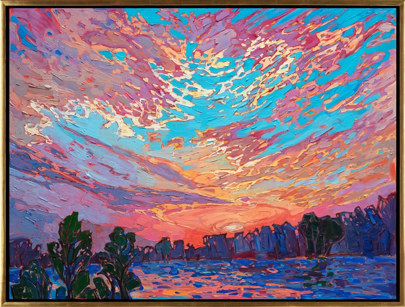 A brilliant sunset bursts across this Northwestern sky, lighting up the rippling waters below, while the trees in the foreground darken as dusk approaches. The impasto brush strokes are thick and impressionistic, alive with color and movement.</p><p>"Gilded Clouds" was created on 1-1/2" canvas, with the painting continued around the edges. The piece arrives framed in a contemporary gold floater frame.