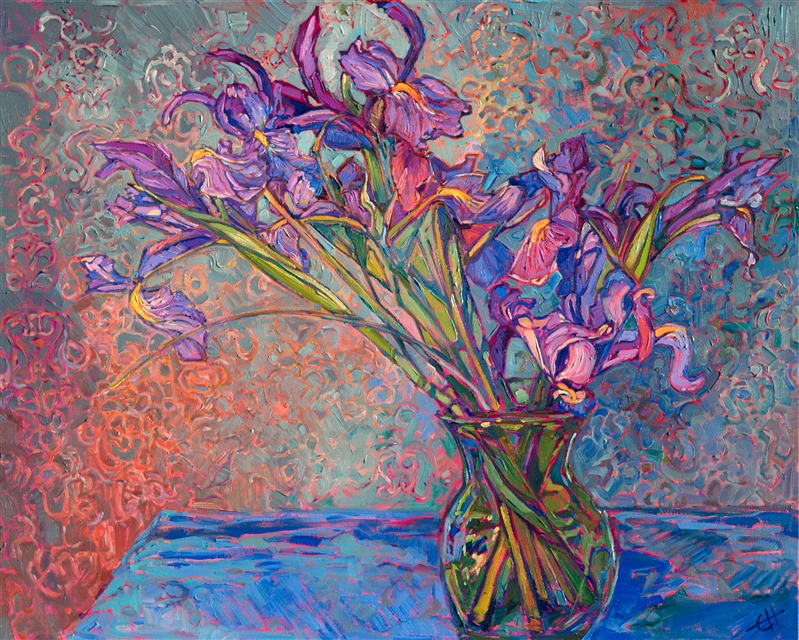 A vase of irises is captured in thick, luscious brushstrokes. The brocade wallpaper makes a beautiful backdrop for the purple flowers.</p><p>This painting was created on 3/4" canvas, and it arrives framed in a hand-carved frame with floral embellishments.