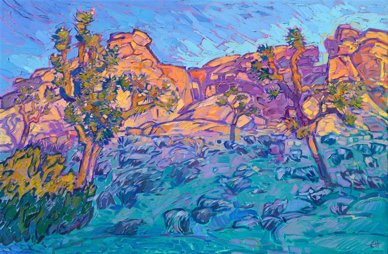 The windy, high desert of Joshua Tree National Park is most beautiful at dawn and sunset. The crystalline granite boulders reflect and refract the colorful light, turning rainbow hues of orange, yellow, purple, and blue. This painting captures the sunset glow highlighting a group of boulders and Joshua trees, while the foreground fades into twilight.</p><p>"Joshua Golds" is an original oil painting on stretched canvas. The piece arrives framed in a contemporary gold floater frame, ready to hang.